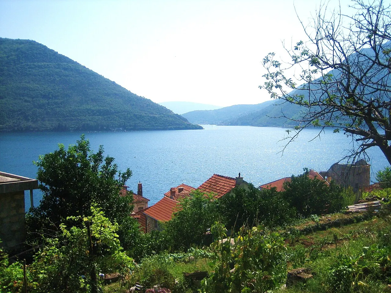 The Bay of Kotor seen from above Perast, the calm water and islands set among steep mountain slopes