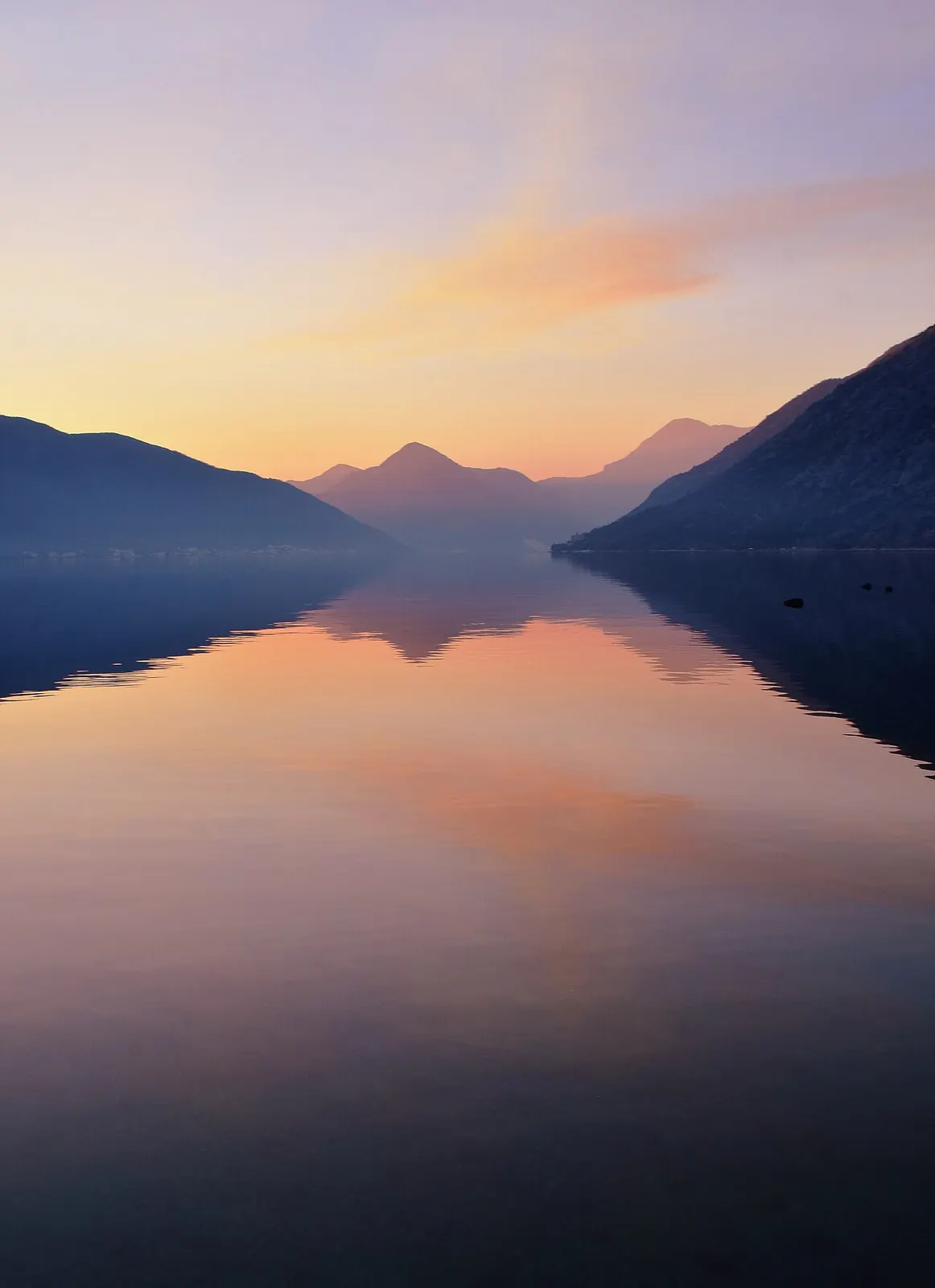 Sunset over the Bay of Kotor seen from the waterfront at Ljuta, Montenegro