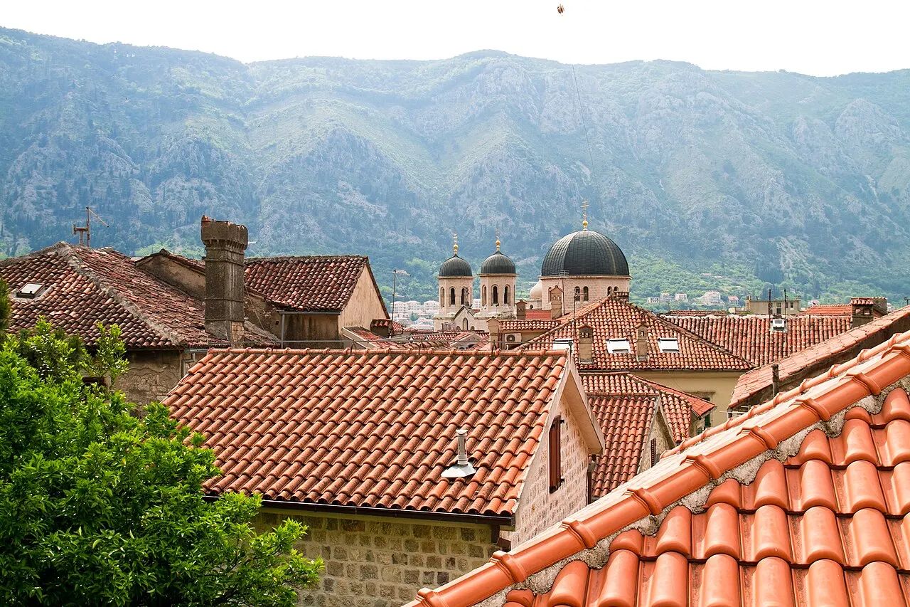Cityscape of Kotor's Old Town and the Bay of Kotor below the mountains