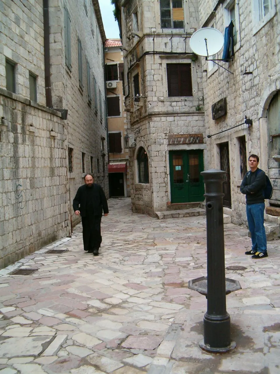 A sunlit stone lane in the Old Town of Kotor, Montenegro