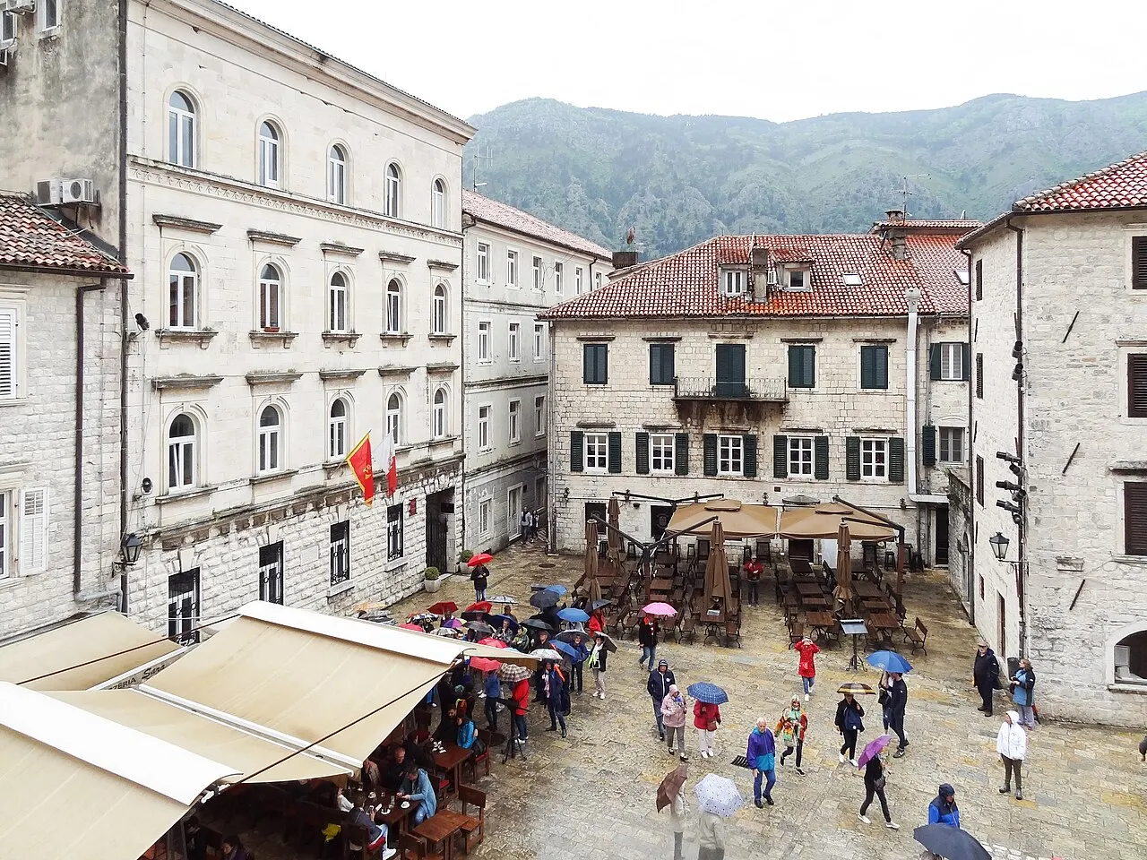 Historic palazzo facades around Tripuna Square in Kotor's walled Old Town, Montenegro