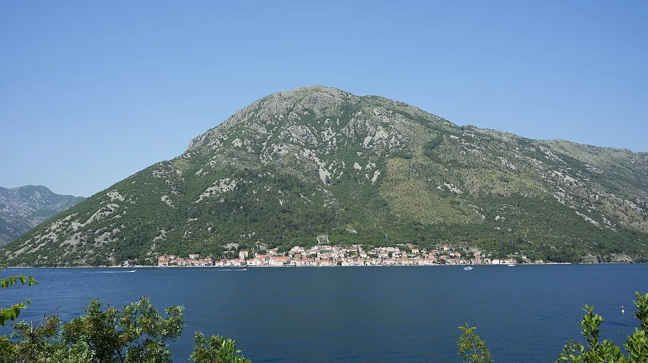 Waterfront stone houses of Perast along the calm Bay of Kotor, Montenegro