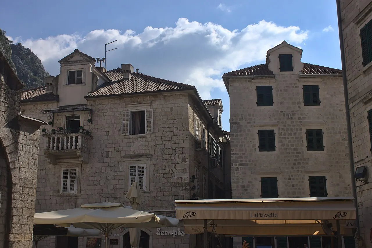Baroque stone houses with balconies on St Luke's Square in Kotor's Old Town