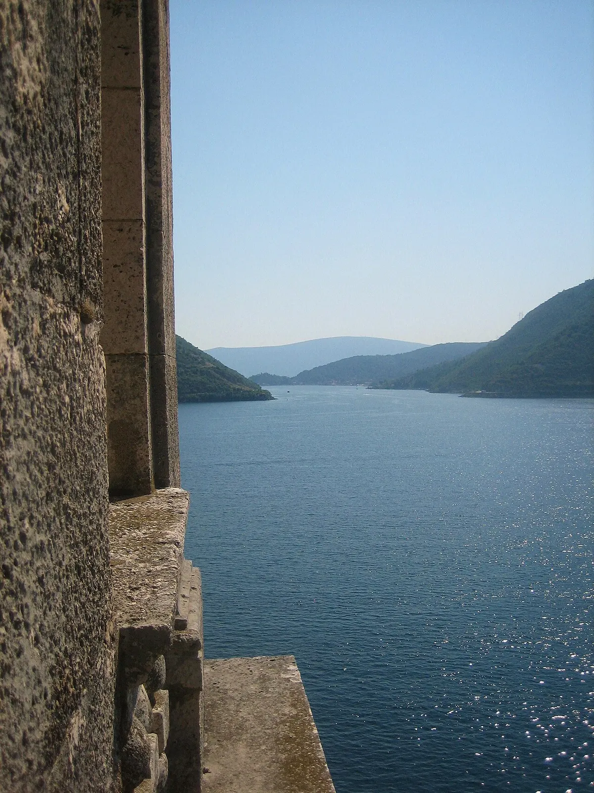 Perast's waterfront and the two islets on the Bay of Kotor seen from above