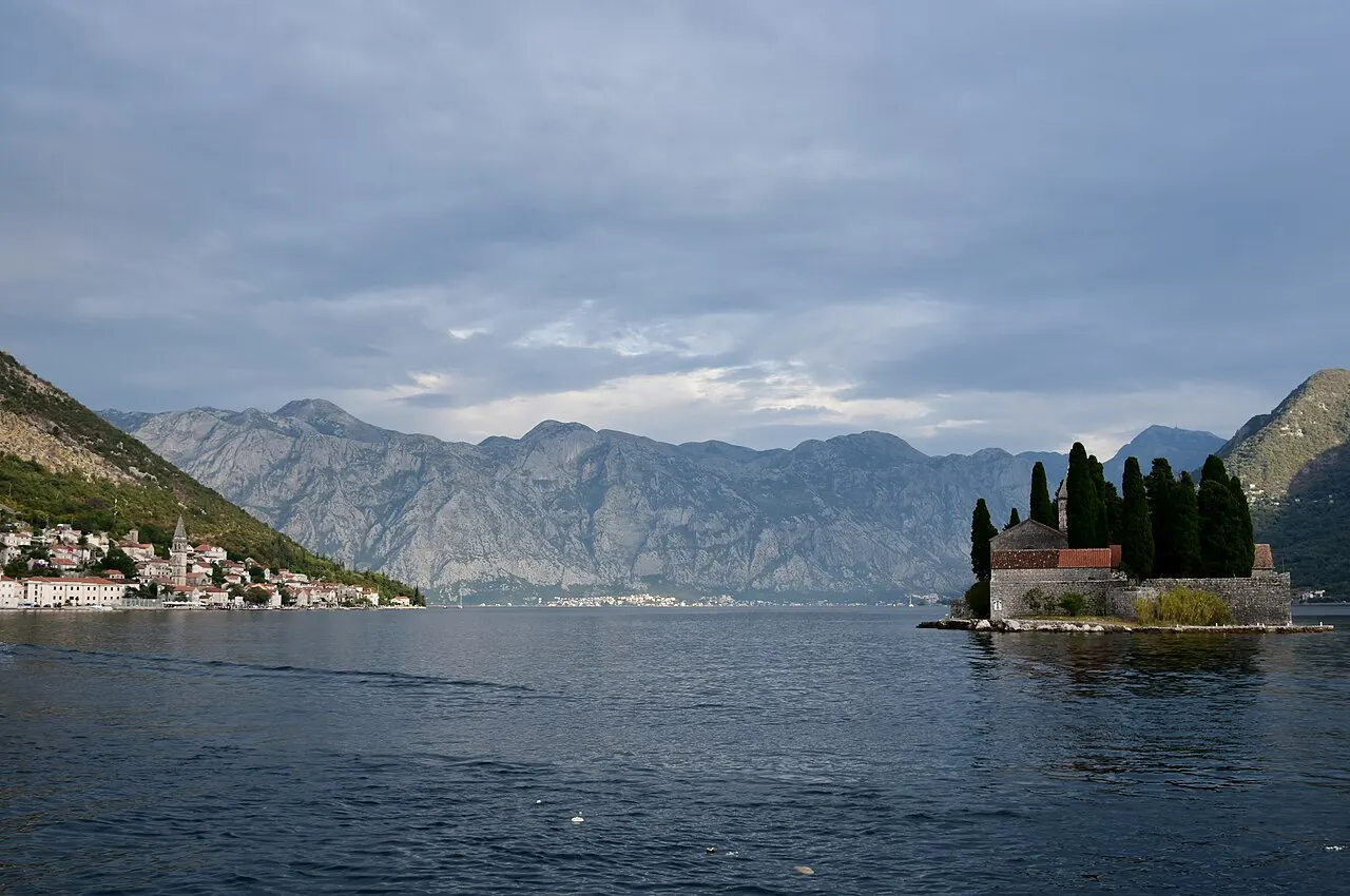The islet of St George rising from the Bay of Kotor, its dark cypresses crowding the old monastery walls