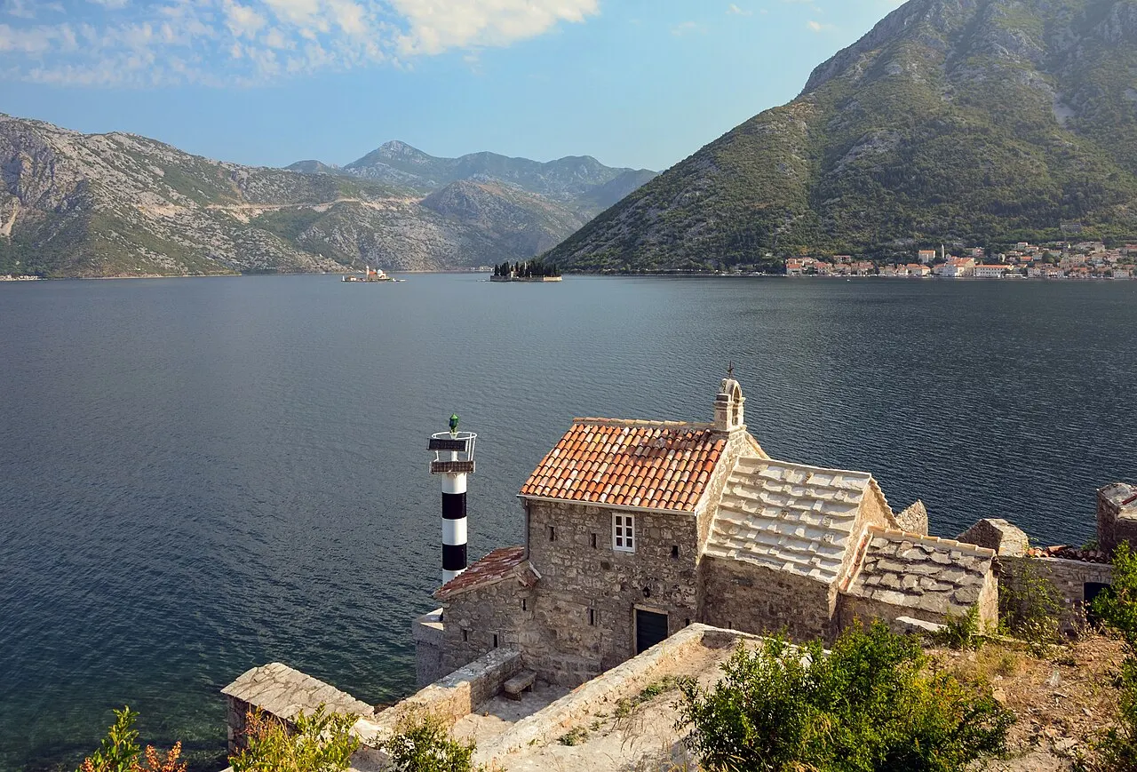 The bayside road linking Tivat to Kotor, open water on one side and mountains on the other
